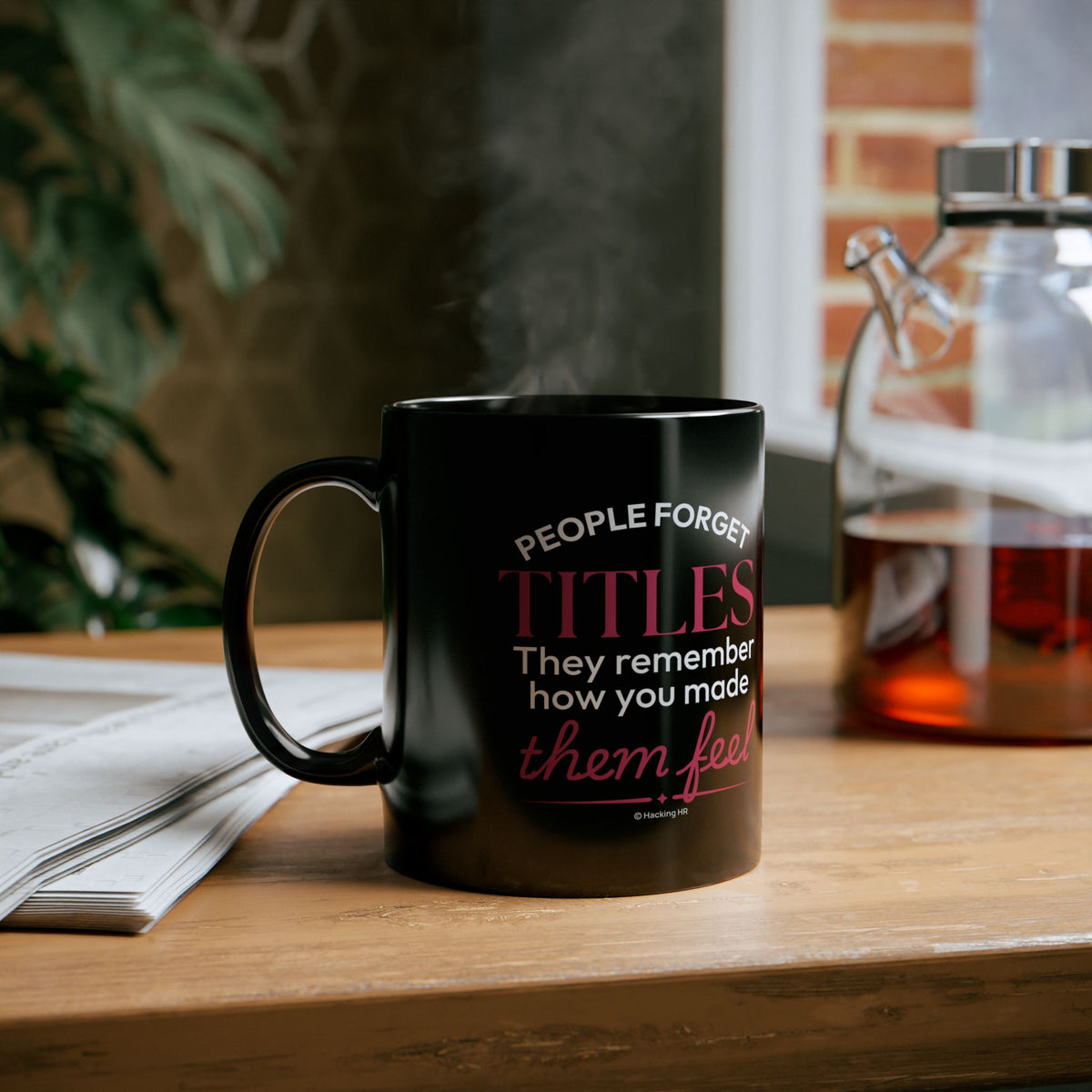 "People Forget Titles. They Remember How You Made Them Feel." – Black Ceramic Mug | Inspirational HR Gift