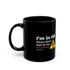 "I'm in HR. Please Don't Lean on Me. I'm Unstable. Thank You." – Black Ceramic Mug | Funny HR Gift