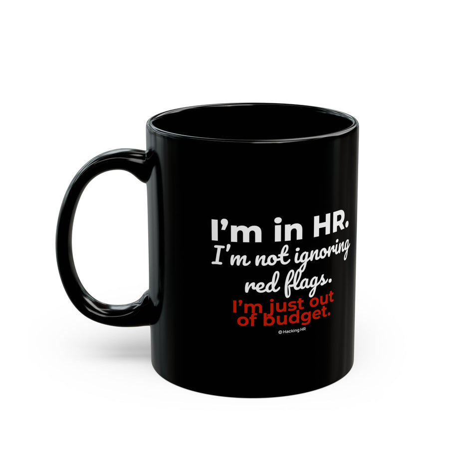 "I'm in HR. I'm Not Ignoring Red Flags. I'm Just Out of Budget." – Black Ceramic Mug | Funny HR Gift